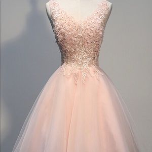Brand new, never worn, blush dress.